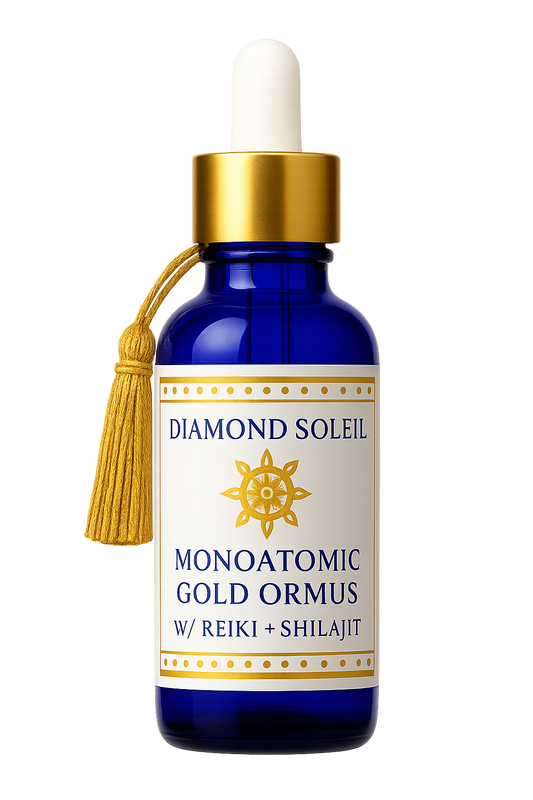 Diamond Soleil Monoatomic Gold ORMUS Elixir in cobalt blue glass bottle with white dropper and gold collar, featuring a gold tassel on a white background