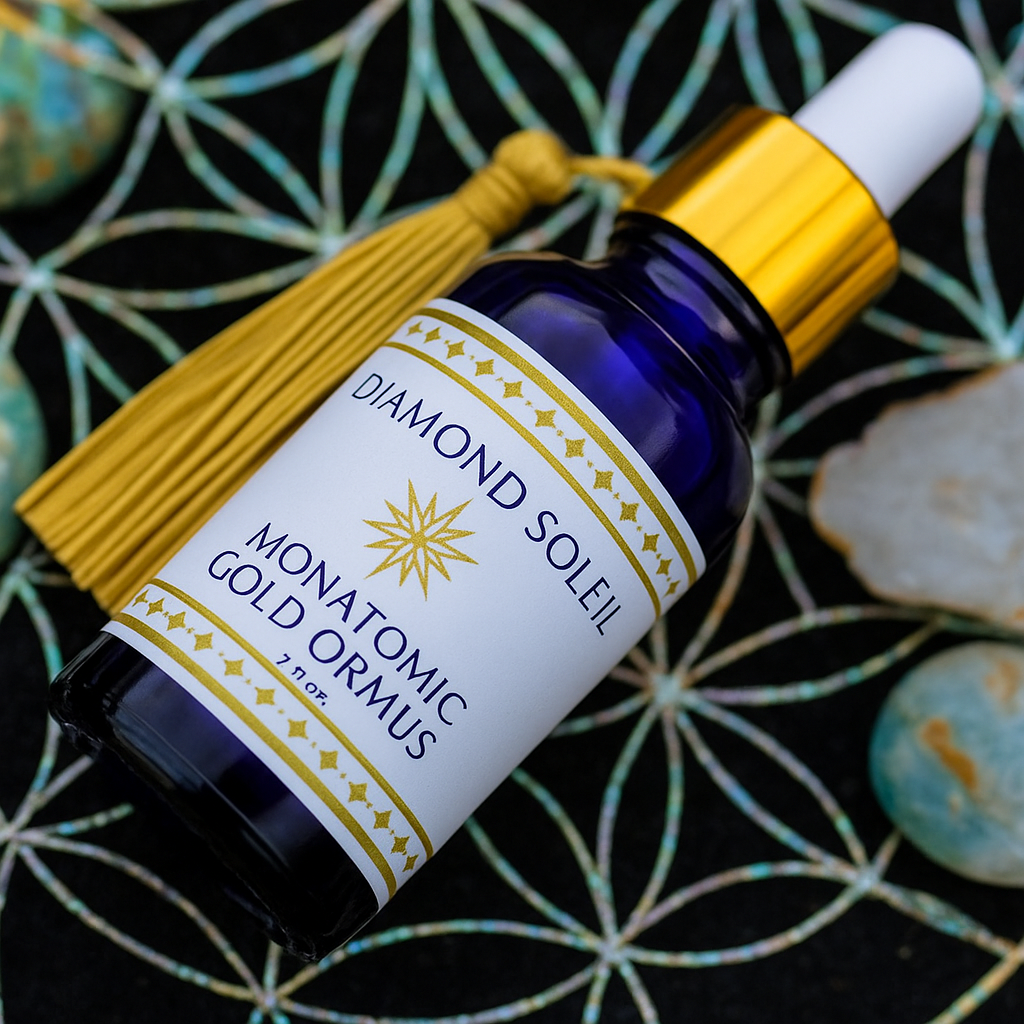 Close-up of Diamond Soleil Monoatomic Gold ORMUS bottle lying on sacred geometry cloth with golden tassel.
